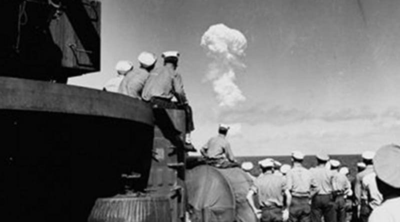 Sailors watched the Able Test burst miles out to sea from the deck of the support ship USS Fall River on July 1, 1946. Credit Naval History and Heritage Command