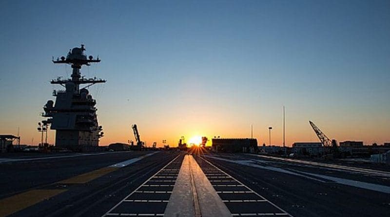 The sun rises over Pre-Commissioning Unit Gerald R. Ford (CVN 78), marking the beginning of the second day of Fast Cruise. Ford is conducting a three-day Fast Cruise to familiarize the crew with the ship's systems for an extended period of time. (U.S. Navy photo by Mass Communication Specialist Seaman Ryan Carter/Released)