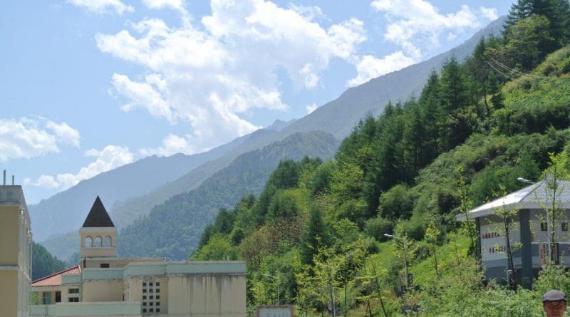 A village in the Wolong Nature Reserve in China's Sichuan Province is nestled closely with the reserve's biodiversity-rich mountains. Credit Sue Nichols, Michigan State University