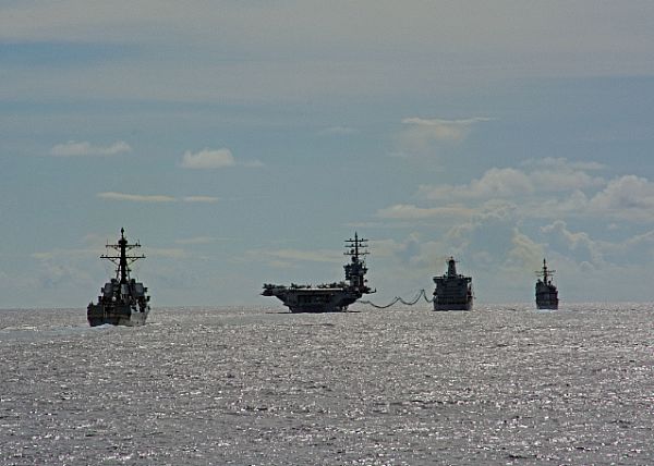 Ships assigned to the Eisenhower Carrier Strike Group (Ike CSG) conduct a replenishment-at-sea with the Military Sealift Command fleet replenishment oiler USNS Big Horn (T-AO 198). Ike CSG is deployed to the U.S. 5th and 6th Fleet areas of responsibility in support of maritime security operations and theater security cooperation efforts. The Ike CSG includes USS Dwight D. Eisenhower (CVN 69) (Ike), Carrier Air Wing (CVW) 3, Destroyer Squadron (DESRON) 26 and ships USS San Jacinto (CG 56), USS Monterey (CG 61), USS Stout (DDG 55), USS Roosevelt (DDG 80), USS Nitze (DDG 94) and USS Mason (DDG 87). (U.S. Navy photo by Seaman Janweb B. Lagazo/Released)