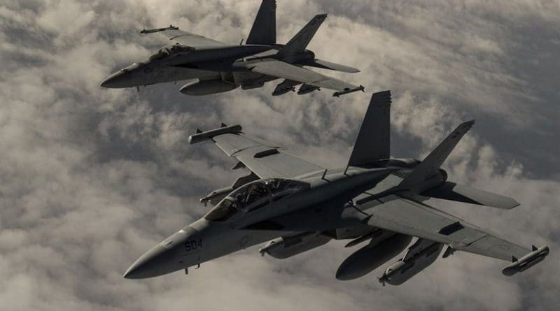U.S. Navy F-18 Hornet fighters fly over Iraq. Air Force photo by Staff Sgt. Corey Hook.