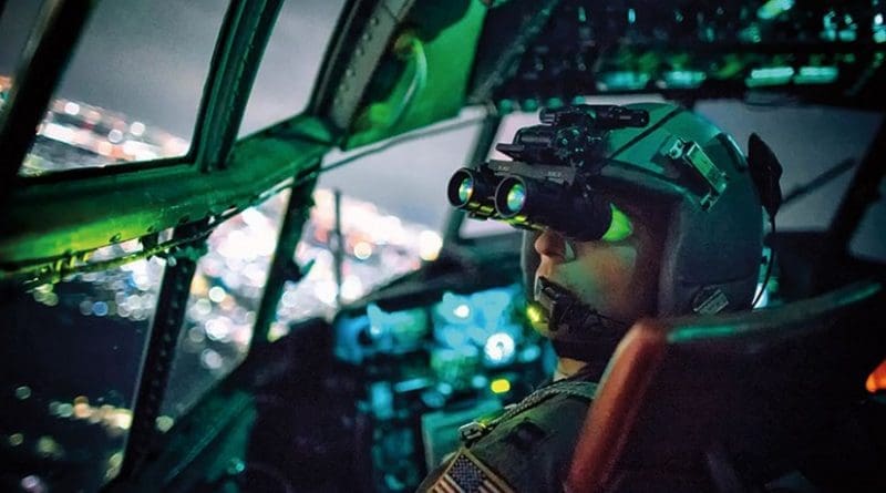 C-130 Hercules pilot with 36th Airlift Squadron performs visual confirmation with night vision goggles during training mission over Kanto Plain, Japan, October 14, 2015 (U.S. Air Force/Osakabe Yasuo)
