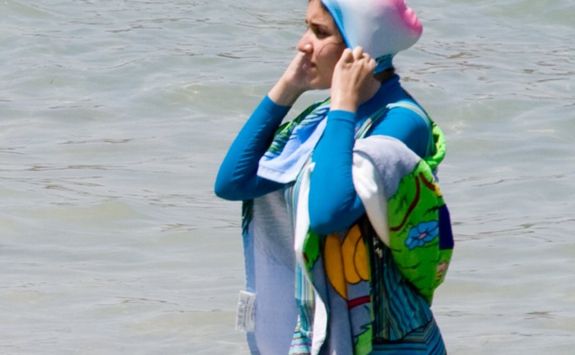 Woman in a burqini. Photo by Giorgio Montersino, Wikipedia Commons.