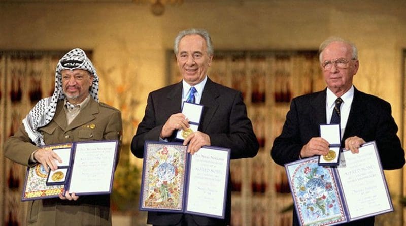 The Nobel Peace Prize laureates for 1994 in Oslo. From left to right: PLO Chairman Yasser Arafat, Israeli Foreign Minister Shimon Peres, Israeli Prime Minister Yitzhak Rabin. Credit: Saar Yaacov, GPO - Government Press Office, Israel, Wikimedia Commons