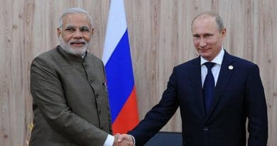 Russia's Vladimir Putin shakes hand with India's Narendra Modi. Photo Credit: Kremlin.ru, Wikipedia Commons.