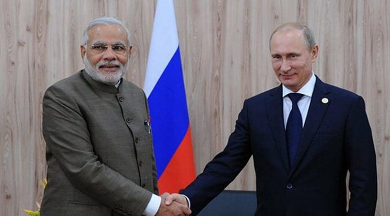 Russia's Vladimir Putin shakes hand with India's Narendra Modi. Photo Credit: Kremlin.ru, Wikipedia Commons.