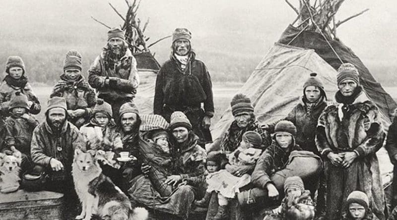 Nomadic Sami people with reindeer skin tents and clothing in 1900-1920. Photo Credit: Granbergs Nya Aktiebolag, Wikipedia Commons.