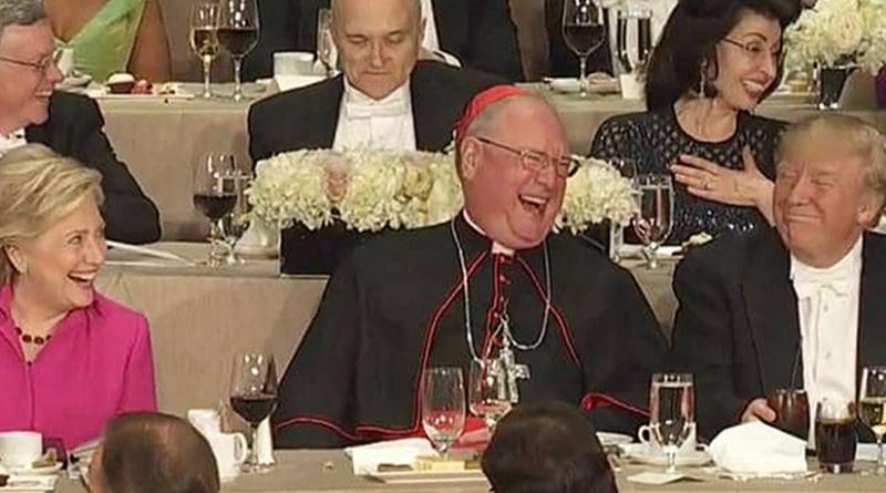 Screenshot from 2016 Al Smith Dinner, with Hillary Clinton, Cardinal Timothy Dolan, and Donald Trump. Screenshot NY Times YouTube video.