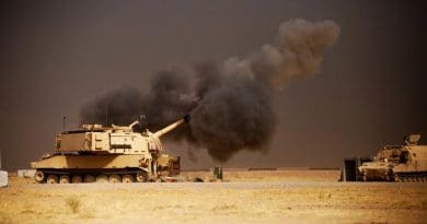 A U.S. Army M109A6 Paladin howitzer conducts a fire mission at Qayyarah West Airfield, Iraq, in support of the Iraqi forces’ push toward Mosul, Oct. 17, 2016. The support provided by the Paladin teams denies safe havens to the Islamic State of Iraq and the Levant while providing Iraqi forces with vital artillery capabilities during their advance. Army photo by Spc. Christopher Brecht