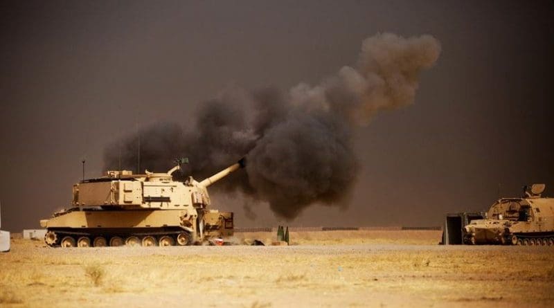 A U.S. Army M109A6 Paladin howitzer conducts a fire mission at Qayyarah West Airfield, Iraq, in support of the Iraqi forces’ push toward Mosul, Oct. 17, 2016. The support provided by the Paladin teams denies safe havens to the Islamic State of Iraq and the Levant while providing Iraqi forces with vital artillery capabilities during their advance. Army photo by Spc. Christopher Brecht