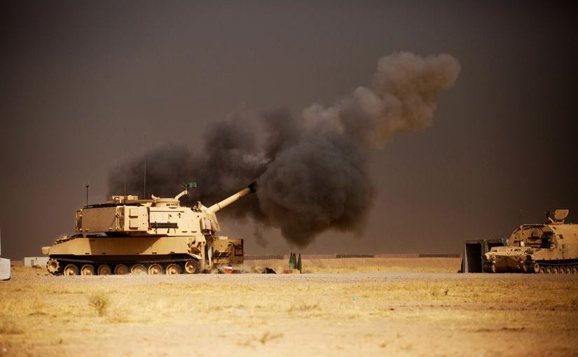 A U.S. Army M109A6 Paladin howitzer conducts a fire mission at Qayyarah West Airfield, Iraq, in support of the Iraqi forces’ push toward Mosul, Oct. 17, 2016. The support provided by the Paladin teams denies safe havens to the Islamic State of Iraq and the Levant while providing Iraqi forces with vital artillery capabilities during their advance. Army photo by Spc. Christopher Brecht