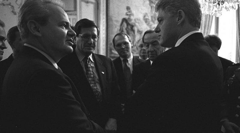 President Clinton talking with Serbian President Slobodan Milosevic. Photo Credit: CIA