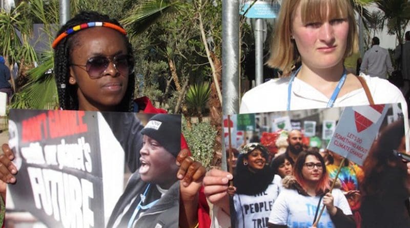 Two women protest. Photo credit: Fabiola Ortiz