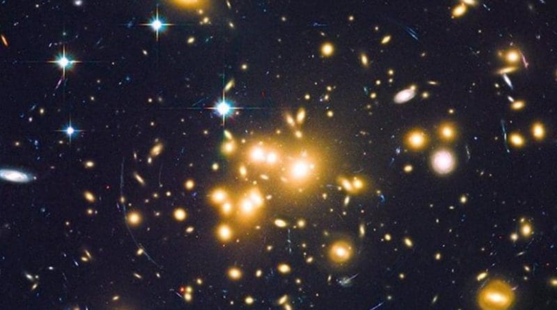 Massive cluster of galaxies Abell 1689 creates a strong gravitational effect on background and older galaxies, seen as arcs of light. Credit NASA, ESA, B. Siana, and A. Alavi