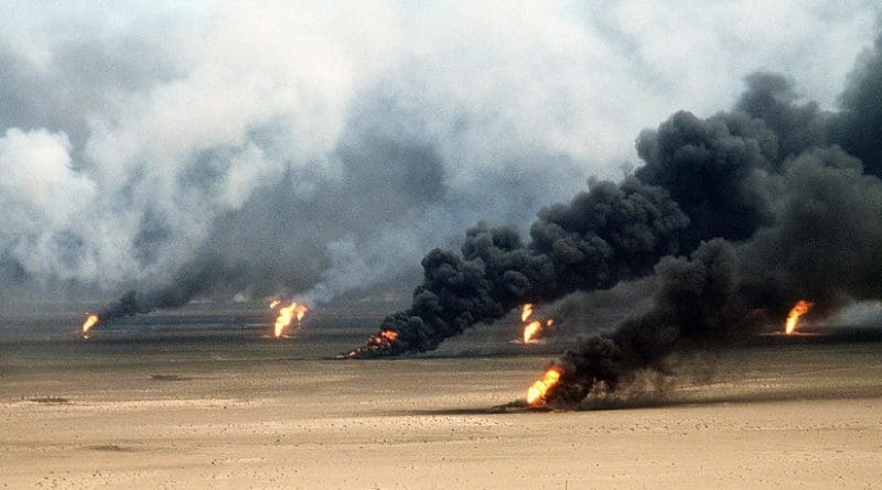 Oil well fires rage outside Kuwait City in the aftermath of Operation Desert Storm. Photo by Tech. Sgt. David McLeod, Wikipedia Commons.