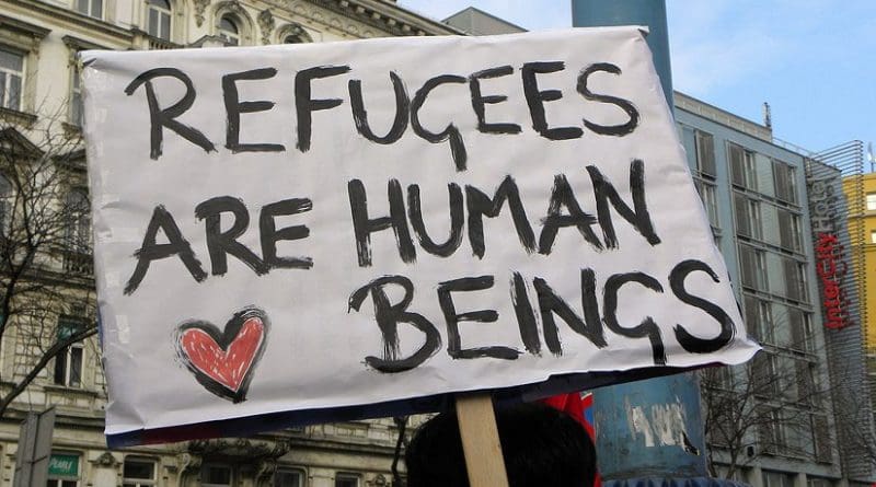 Pro-refugee sign. Photo by Haeferl, Wikimedia Commons.