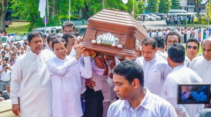 Sri Lanka's President Maithripala Sirisena carrying the remains of Maestro W D Amaradeva. Photo Credit: Sri Lanka government.