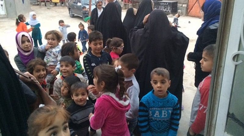 Families that fled Mosul, living near Najaf, Iraq. Photo by Cathy Breen.