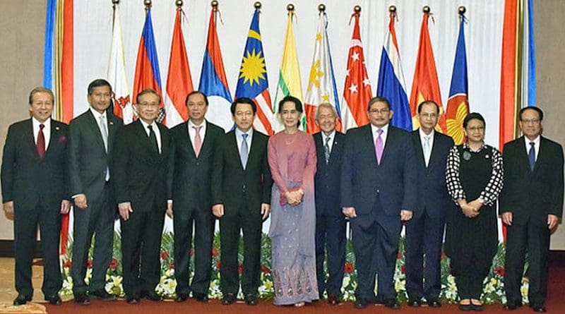 Myanmar State Counsellor and Foreign Affairs Minister Aung San Suu Kyi (centre) and foreign ministers from member states of the ASEAN pose for a group photo in Yangon, December 19, 2016. Photo courtesy of Indonesia's Ministry of Foreign Affairs