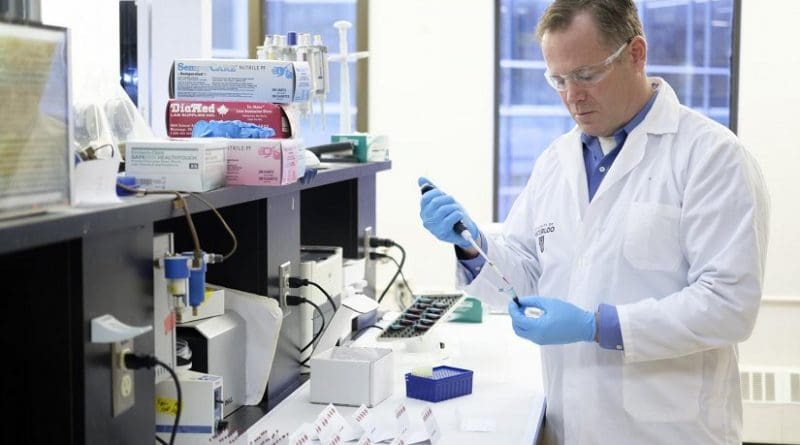 Professor Ken Stark taking a sample of blood in Waterloo's Laboratory of Nutritional and Nutraceutical Research to determine the levels of omega-3 fatty acids. Credit Light Imaging