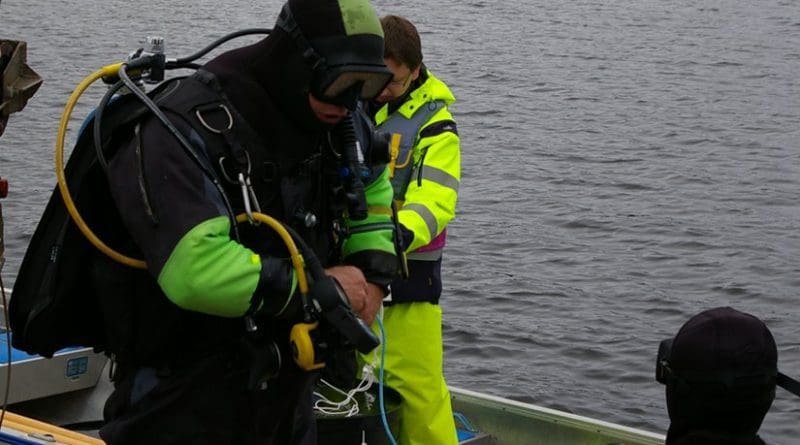 Divers at the Umeå Marine Sciences Centre prepare for sediment sampling in the sea outside the mesocosm facility. A key aspect, and great challenge, of the project was the necessity to use intact natural “sediment cores” large enough to fit the mesocosm experimental systems. Sediment cores with a diameter of 70 centimeters and a depth of 20 centimeters (and a mass of 70 kilograms) were successfully sampled manually by divers and lifted onboard the research vessel R/S Lotty by crane. Photo: Sofi Jonsson