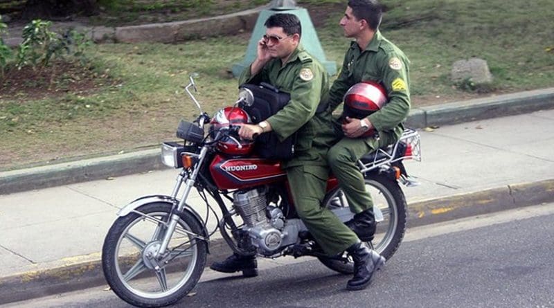 Soldiers of Fuerzas Armadas Revolucionarias on a motorbike. Photo by Bogdan, Wikipedia Commons.