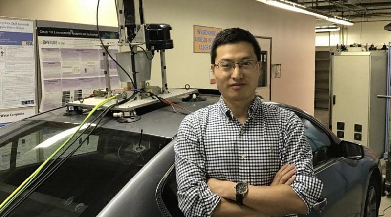 Xuewei Qi and a team of UCR researchers are using vehicle connectivity and evolutionary algorithms to improve the efficiency of Plug-In Hybrid Electric Vehicles. Credit UC Riverside