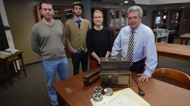 Here with a wire recorder and wire spools that hold the voices of Jewish concentration camp survivors are, from left, James Newhall, who redesigned a useable recorder, along with the Cummings Center's Jon Endres, Dr. Jodi Kearns and Dr. David Baker. Credit The University of Akron