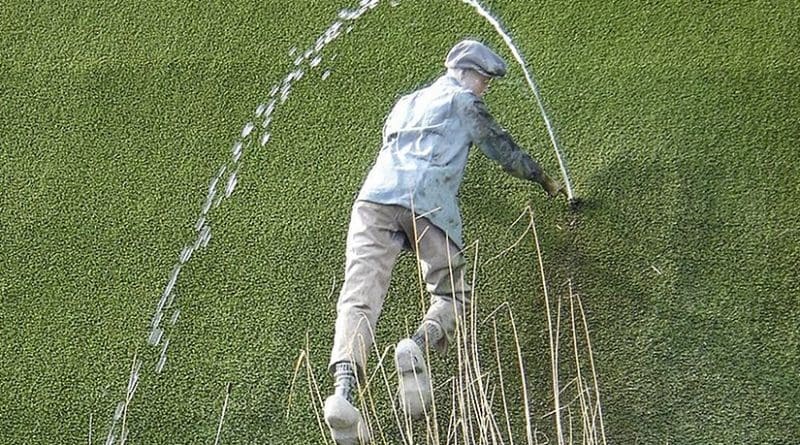 Tourism statue in Madurodam, Netherlands, of the nameless boy plugging a dike. Source: Wikipedia Commons.