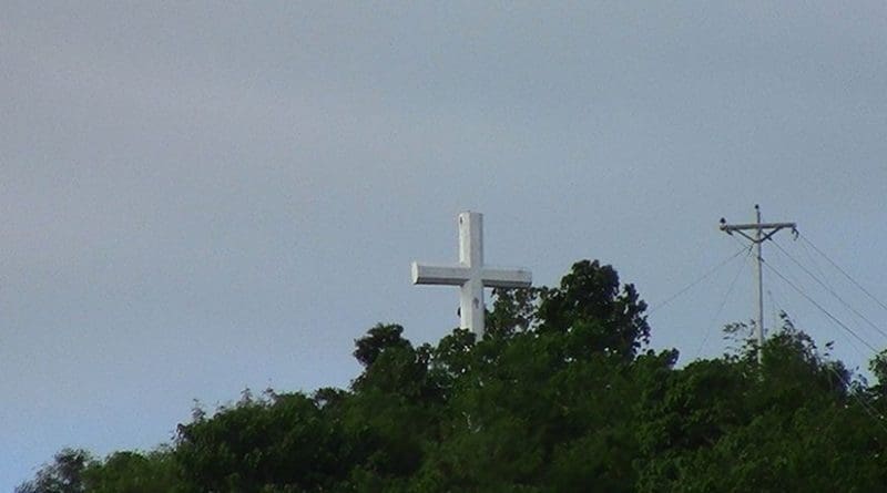 The giant cross atop Guinhangdan Hill, Palo, Philippines, a favorite destination of Holy Week pilgrims. Photo by Bagoto, Wikipedia Commons.