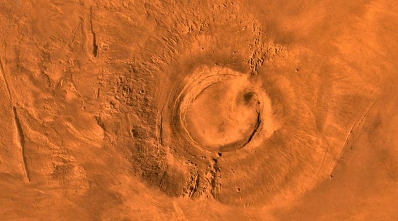 This digital-image mosaic of Mars' Tharsis plateau shows the extinct volcano Arsia Mons. It was assembled from images that the Viking 1 Orbiter took during its 1976-1980 working life at Mars. Credit NASA/JPL/USGS