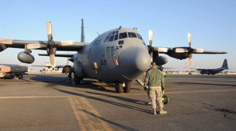 Air Force Staff Sgt. Michael Beaver, a 737th Expeditionary Air Squadron crew chief, watches over a C-130 Hercules as it is refueled at an undisclosed location in Southwest Asia, Feb. 8, 2017. The mission of the 737th is to deliver personnel and cargo downrange in support of Operation Inherent Resolve and its campaign to defeat the Islamic State of Iraq and Syria. Air Force photo by Tech. Sgt. Kenneth McCann