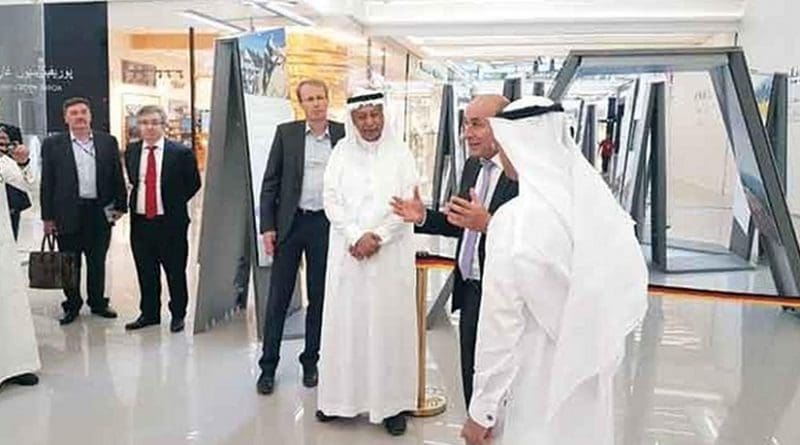 German Ambassador Dieter W. Haller, second from right, meets with guests at exhibition. Photo Credit: Arab News.