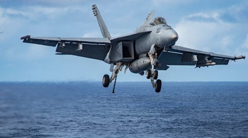 An F/A-18E Super Hornet assigned to the "Kestrels" of Strike Fighter Squadron (VFA) 137 prepares to make an arrested landing aboard the aircraft carrier USS Carl Vinson (CVN 70). The ship's carrier strike group is on a western Pacific deployment as part of the U.S. Pacific Fleet-led initiative to extend the command and control functions of U.S. 3rd Fleet. (U.S. Navy photo by Mass Communication Specialist 2nd Class Sean M. Castellano/Released)