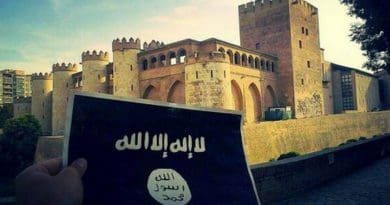 A photo that was tweeted by an Islamic State supporter holding the IS black flag of jihad in front of Aljafería Palace in Zaragoza, Spain.