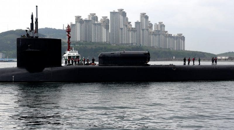 The Ohio-class guided-missile submarine USS Michigan arrives in Busan, South Korea for a scheduled port visit while conducting routine patrols throughout the western Pacific. U.S. Navy photo by Mass Communication Specialist 2nd Class Jermaine Ralliford/Released)