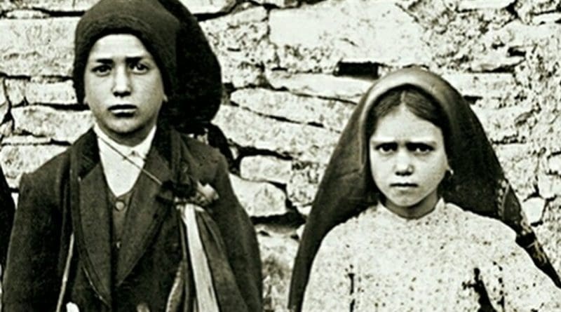 Jacinta and Francisco Marto, the three children whom the Virgin Mary revealed her famous "three secrets" in Fátima, Portugal. Photo credit: Joshua Benoliel, Wikipedia Commons.