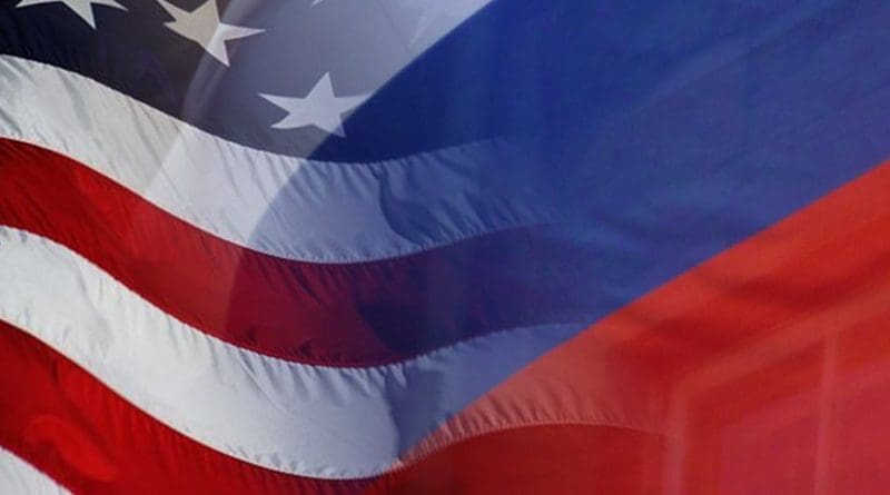 Flags of the United States and Russia.