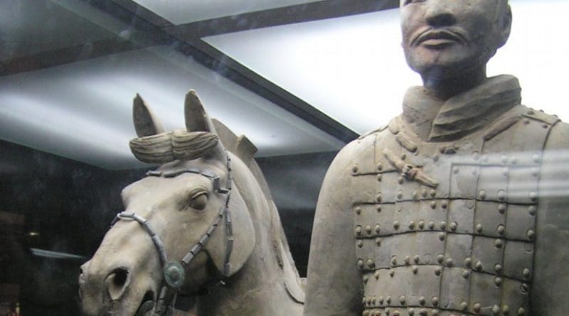 A terracotta soldier with his horse. Photo by Robin Chen, Wikipedia Commons.