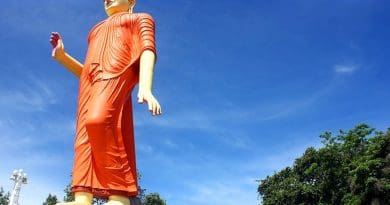 80-foot World's tallest statue of walking Buddha in Pilimathalawa, Kandy, Sri Lanka. Photo by AntanO, Wikipedia Commons.