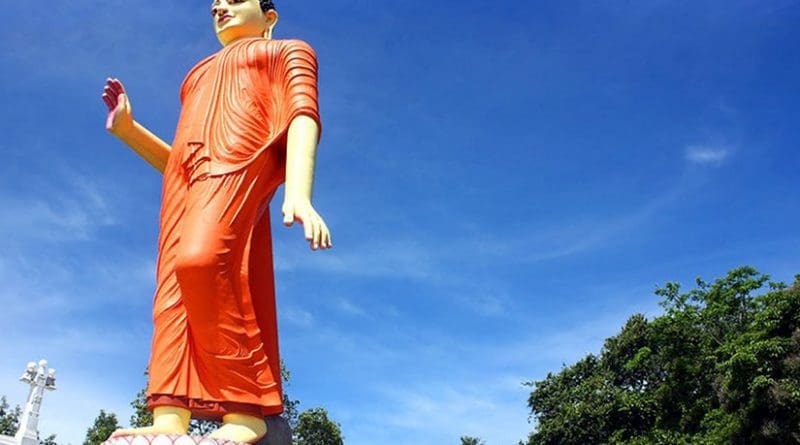 80-foot World's tallest statue of walking Buddha in Pilimathalawa, Kandy, Sri Lanka. Photo by AntanO, Wikipedia Commons.
