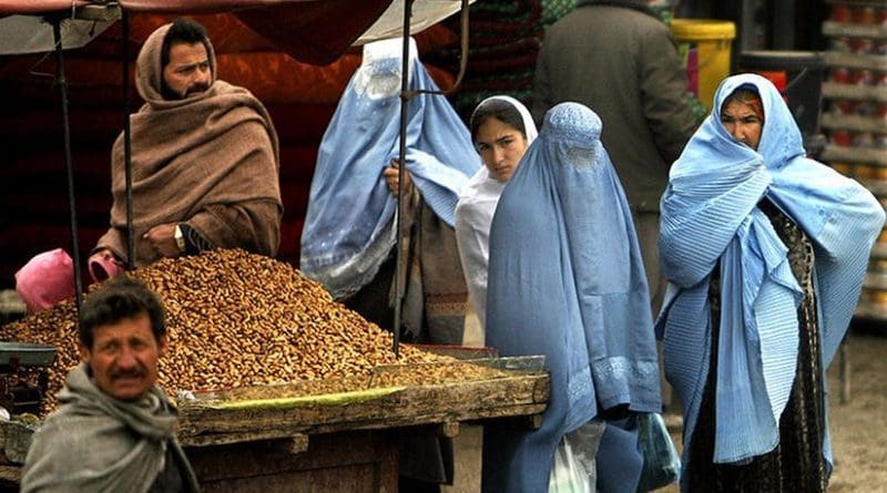 Women in Afghanistan market. Photo by Staff Sgt. Russell Lee Klika, US Army National Guard, Wikimedia Commons.