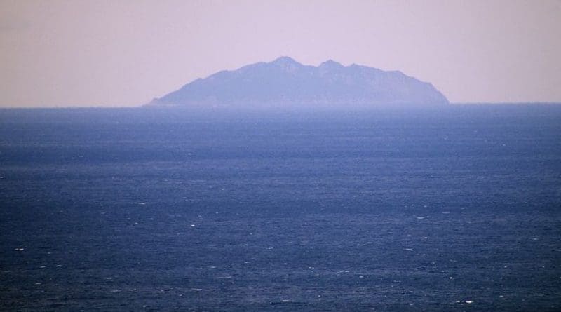 View of Okinoshima Island from Ōshima, Fukuoka, Japan. Photo by WashiTabi, Wikipedia Commons.