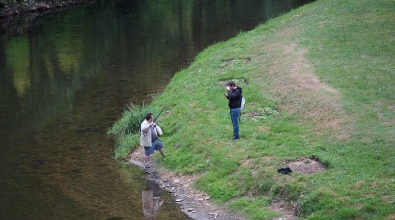Men fishing in France.