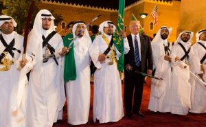 President Donald Trump poses for photos with ceremonial swordsmen on his arrival to Murabba Palace, as the guest of King Salman bin Abdulaziz Al Saud of Saudi Arabia, Saturday evening, May 20, 2017, in Riyadh, Saudi Arabia. (Official White House Photo by Shealah Craighead)