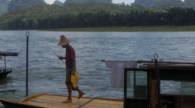 A man fishing in China.
