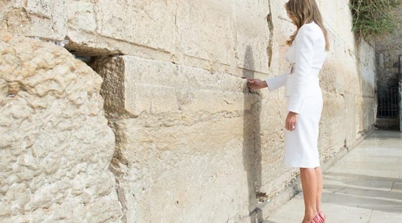 First Lady Melania Trump places a prayer in-between the stone blocks of the Western Wall during an official visit, Monday, May 22, 2017, in Jerusalem. (Official White House Photo by Andrea Hanks)