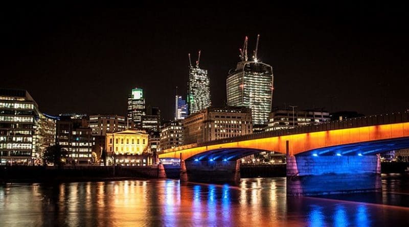 London Bridge in London (UK) at night. File photo by Digital-Designs, Wikipedia Commons.