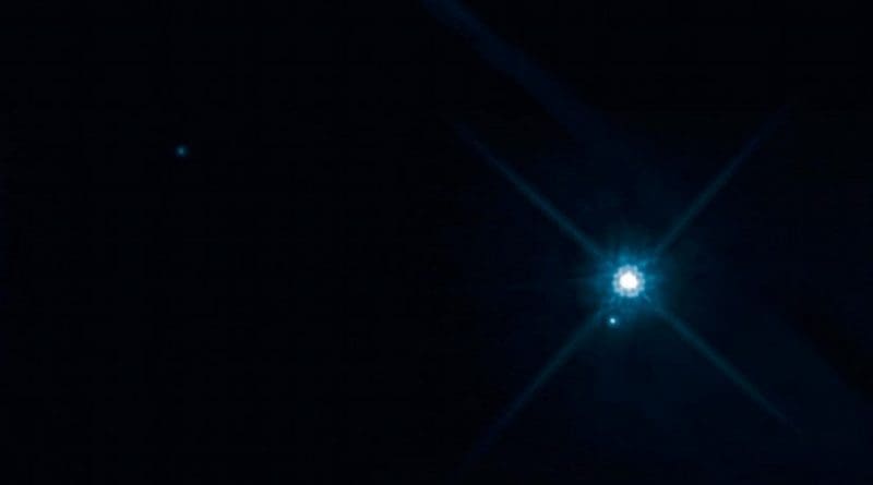 This time-lapse movie, made from eight Hubble Space Telescope images, shows the apparent motion of the white dwarf star Stein 2051 B as it passes in front of a distant star. Credit NASA, ESA, and K. Sahu (STScI)