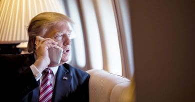 US President Donald Trump on board Air Force One. (Photo by Shealah Craighead, White House).